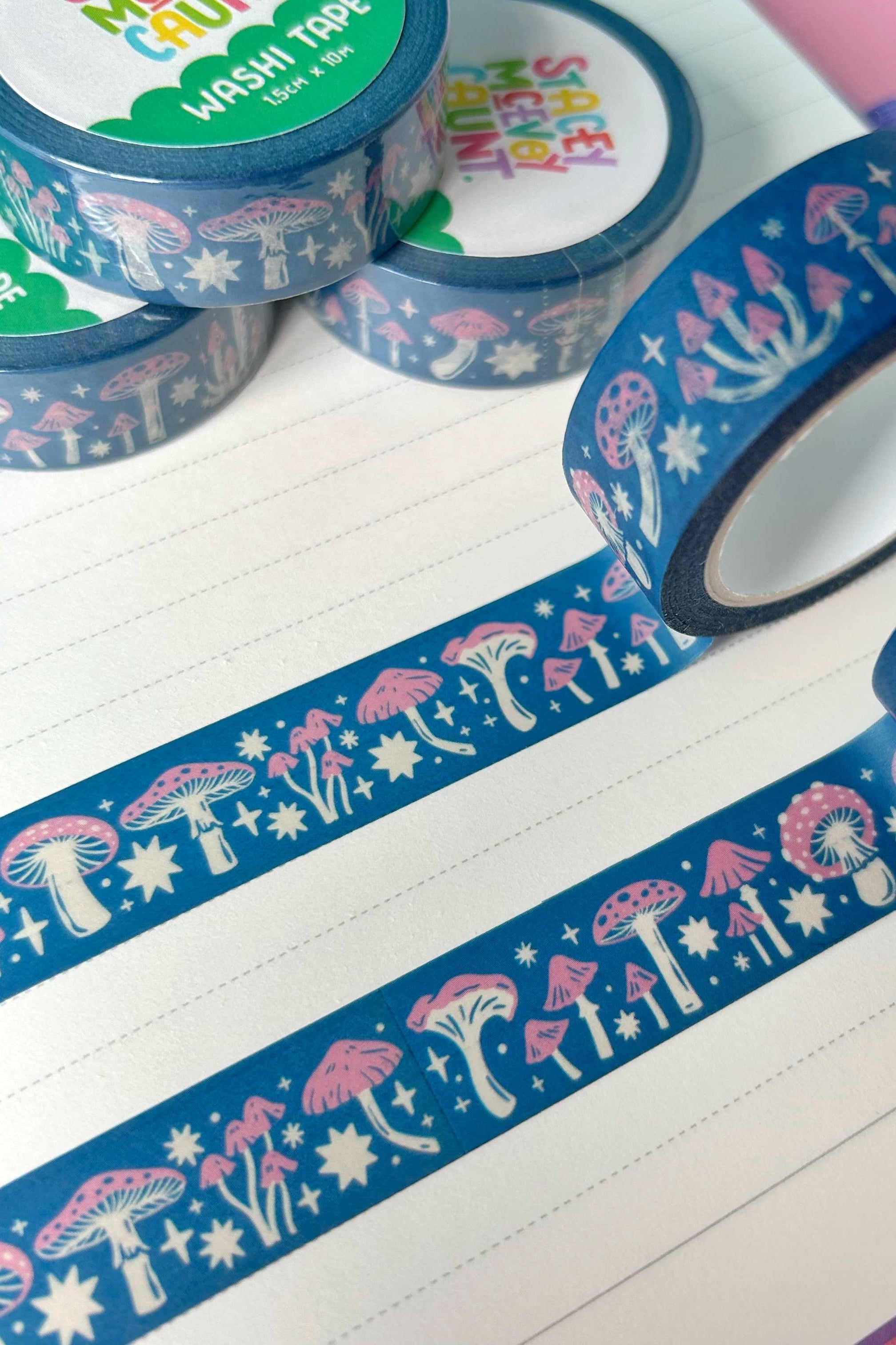 Washi tape with mushroom design on a notebook page