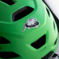 Reflective sticker of a cute rat on a skateboard shown on a child's bike helmet