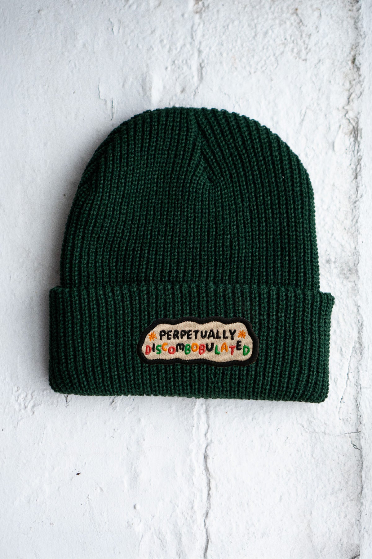 Perpetually Discombobulated Patched Shaker Stitch Beanie