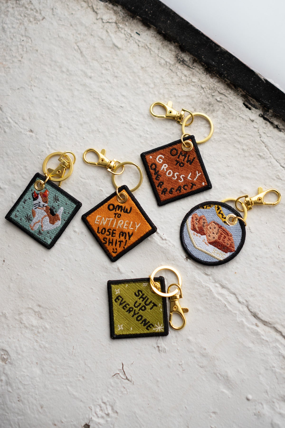 OMW to Overreact - Embroidered Keychain