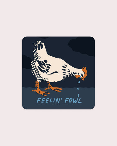 Sticker featuring a crying chicken with the phrase "feelin' fowl"