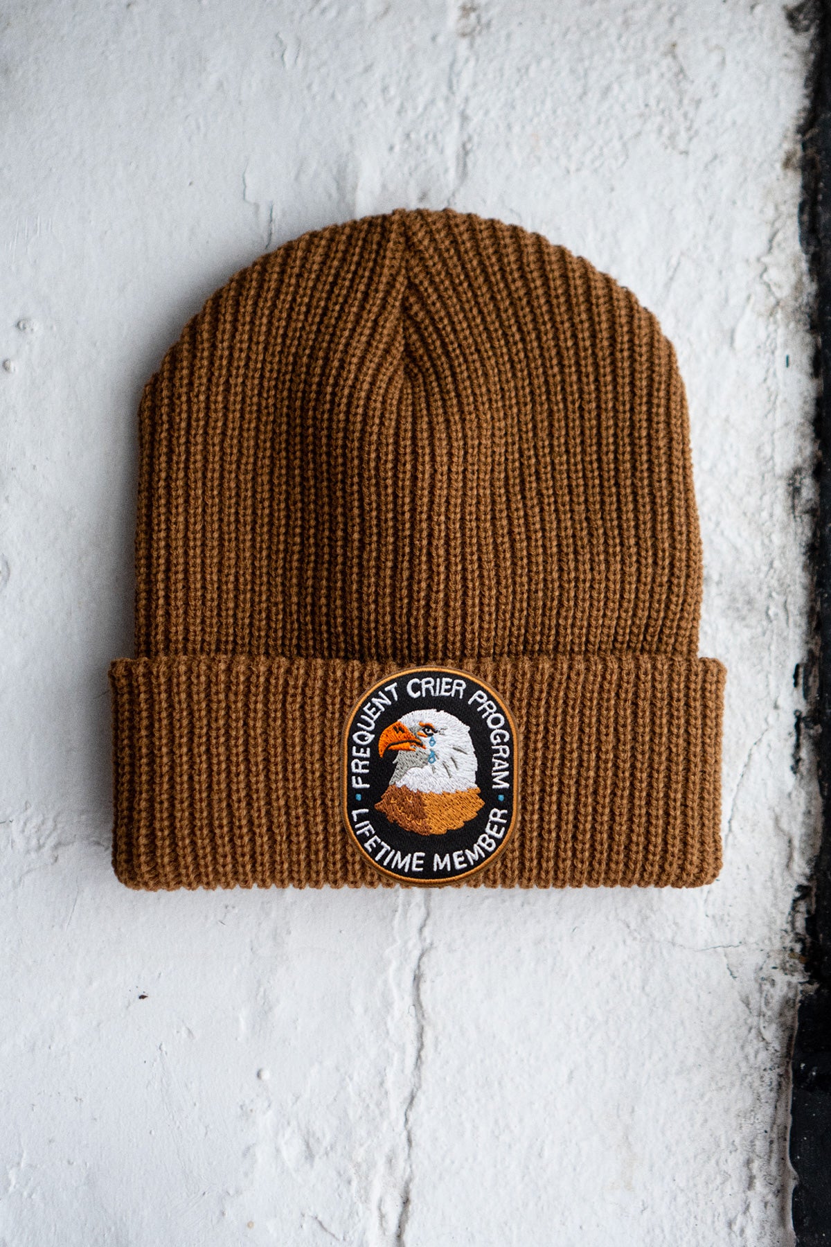 Frequent Crier Patched Shaker Stitch Beanie