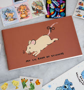 Small sticker album with a cute mouse and "my lil book of stickers" printed on the cover