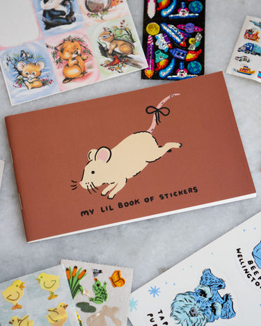 Small sticker album with a cute mouse and "my lil book of stickers" printed on the cover