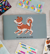 Sticker album with a dog and "my very good stickers" printed on the cover