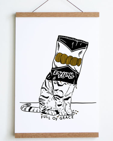 black line drawing of sitting cat with black and white chip bag with text ruffles and yellow chips over its head 